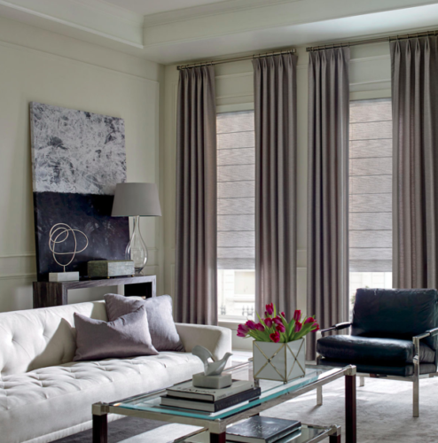 Design studio roman shade with panel drapery